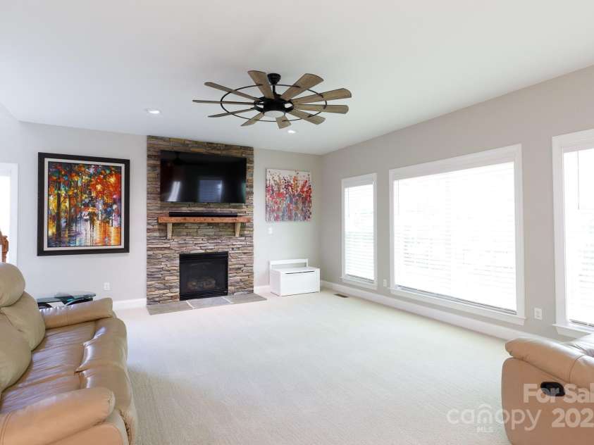 905 Patricians Lane, Monroe, NC 28110.  MLS# CAR4255344, YatesRealty ID 34938. Keeping room w/ cozy fireplace!
