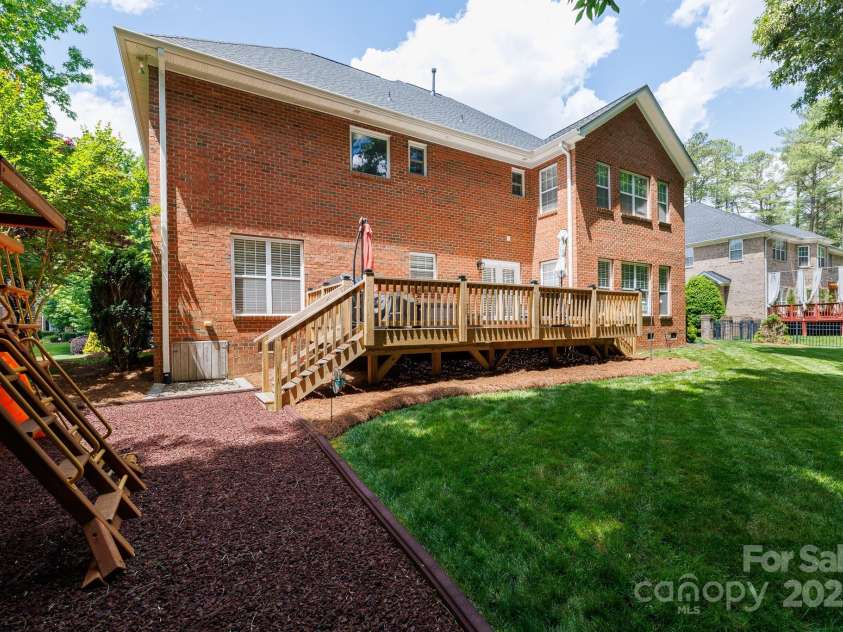 905 Patricians Lane, Monroe, NC 28110.  MLS# CAR4255344, YatesRealty ID 34938. New and extended back deck w/ playset !