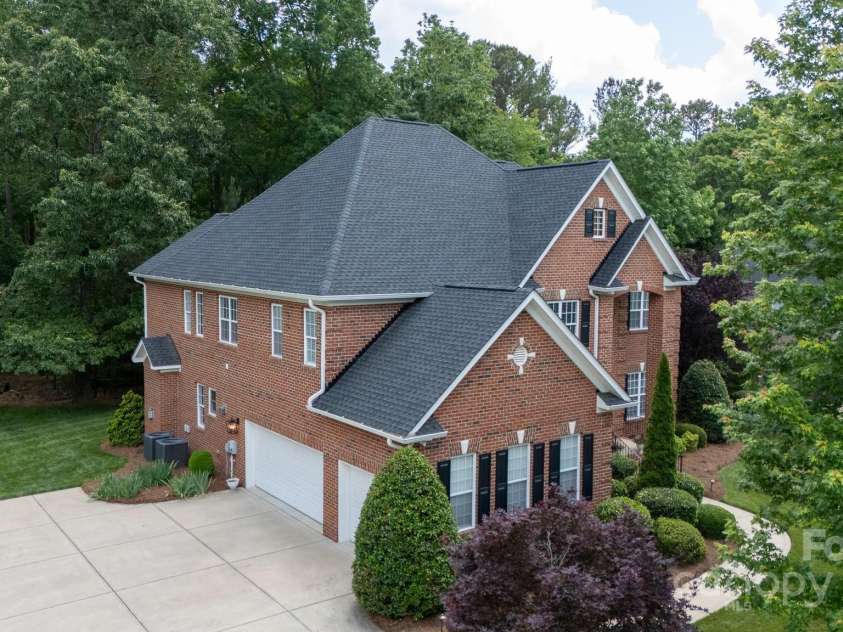 905 Patricians Lane, Monroe, NC 28110.  MLS# CAR4255344, YatesRealty ID 34938. Triple garage, extended parking and New roof!!