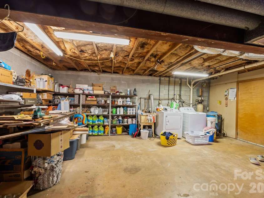 3114 New Leicester Highway, Leicester, NC 28748.  MLS# CAR4314334, YatesRealty ID 3494. Basement laundry