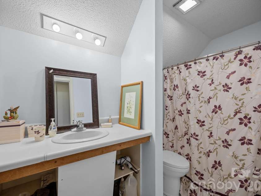3114 New Leicester Highway, Leicester, NC 28748.  MLS# CAR4314334, YatesRealty ID 3494. Upper bathroom