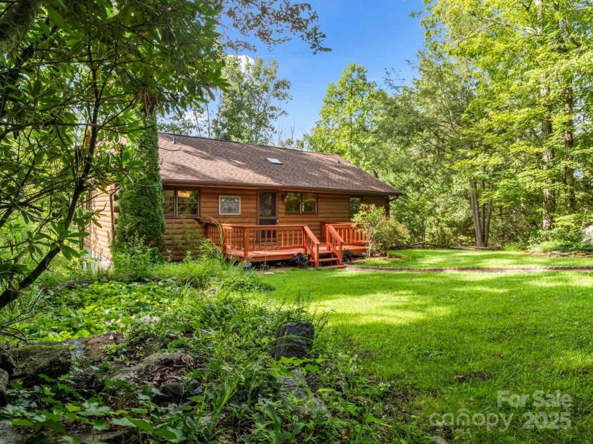 194 Bear Creek Drive, Fletcher, NC 28732.  MLS# CAR4287026, YatesRealty ID 34943. Come enjoy this sweet home nestled in nature, but a short drive to shopping and dining of South Asheville.