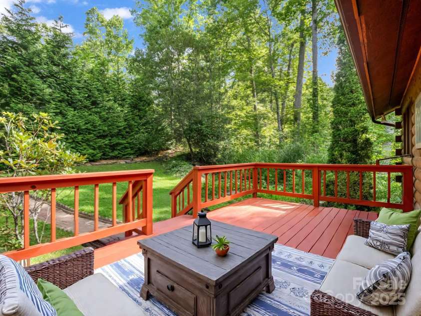 194 Bear Creek Drive, Fletcher, NC 28732.  MLS# CAR4287026, YatesRealty ID 34943. Step onto the front porch and relax - listen to the waterfall and take a deep breath.