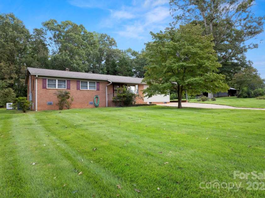 3110 Zion Church Road, Shelby, NC 28150.  MLS# CAR4291685, YatesRealty ID 34945. A picturesque setting for the nice brick ranch!