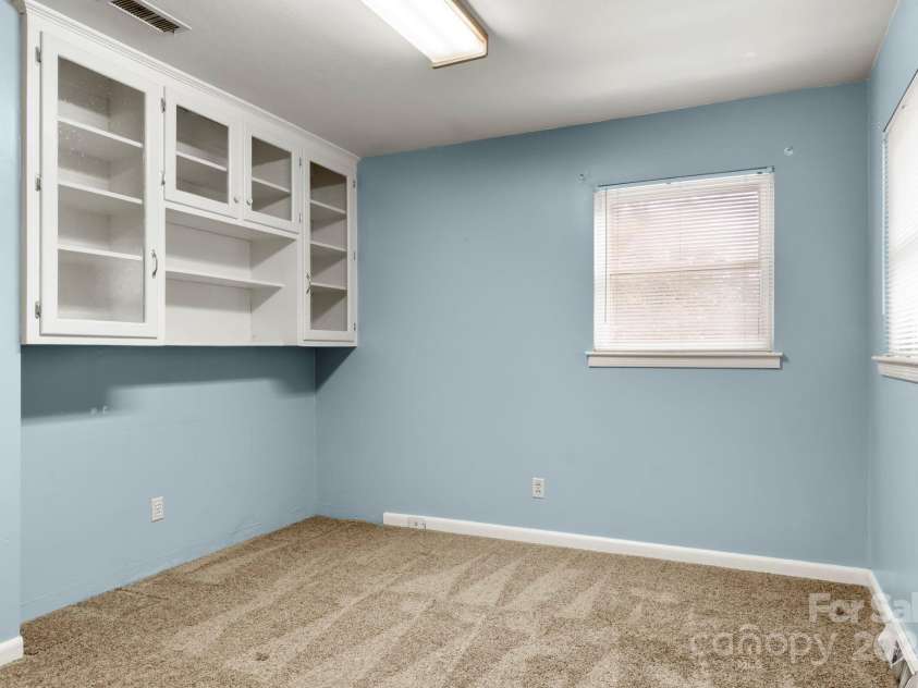 3110 Zion Church Road, Shelby, NC 28150.  MLS# CAR4291685, YatesRealty ID 34945. Bedroom #2 with built-in cabinets...