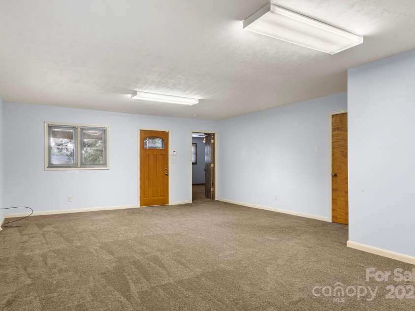 3110 Zion Church Road, Shelby, NC 28150.  MLS# CAR4291685, YatesRealty ID 34945. Bonus room has door to carport, den, and primary bedroom