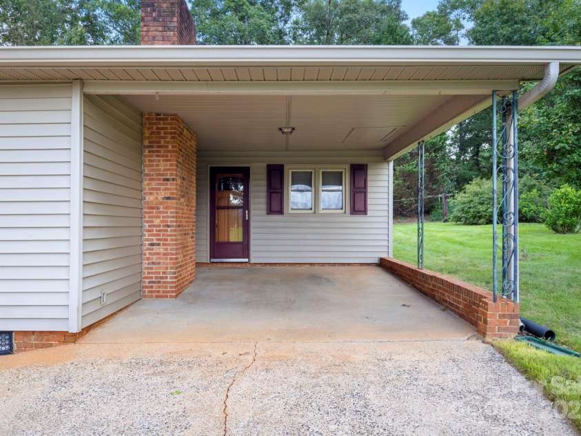 3110 Zion Church Road, Shelby, NC 28150.  MLS# CAR4291685, YatesRealty ID 34945. Carport w/ entry into bonus room