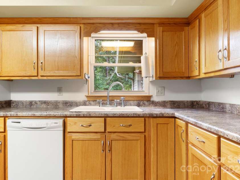 3110 Zion Church Road, Shelby, NC 28150.  MLS# CAR4291685, YatesRealty ID 34945. Kitchen sink window looks out to back yard