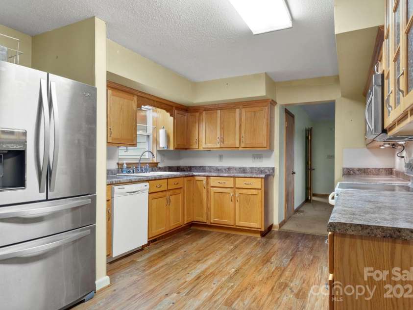 3110 Zion Church Road, Shelby, NC 28150.  MLS# CAR4291685, YatesRealty ID 34945. Stainless steel refrigerator remains!