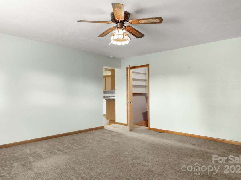 3110 Zion Church Road, Shelby, NC 28150.  MLS# CAR4291685, YatesRealty ID 34945. View from den to kitchen and laundry room