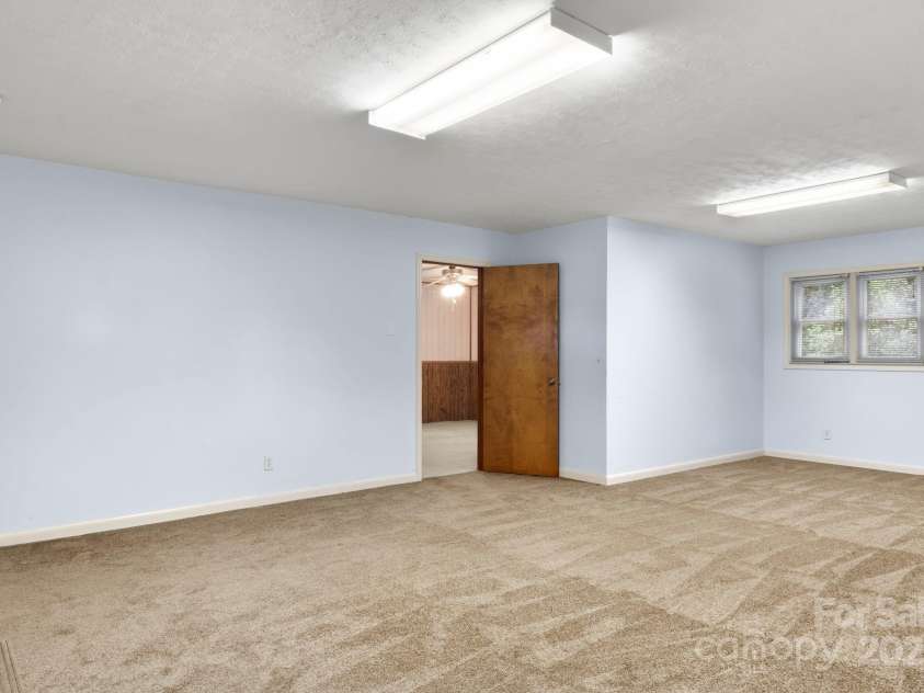 3110 Zion Church Road, Shelby, NC 28150.  MLS# CAR4291685, YatesRealty ID 34945. View of bonus room and door to primary bedroom