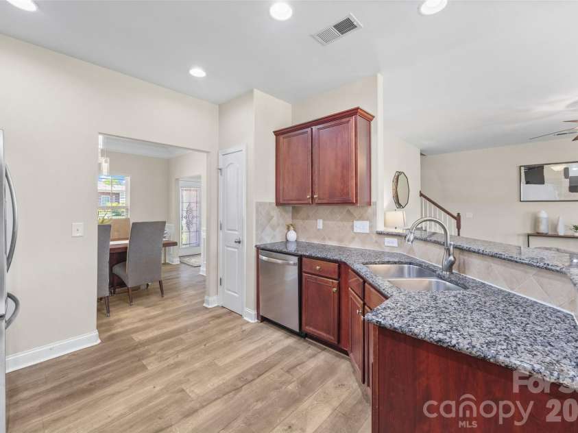 14712 Vaughan Drive, Charlotte, NC 28273.  MLS# CAR4390670, YatesRealty ID 34949. Breakfast bar in Kitchen