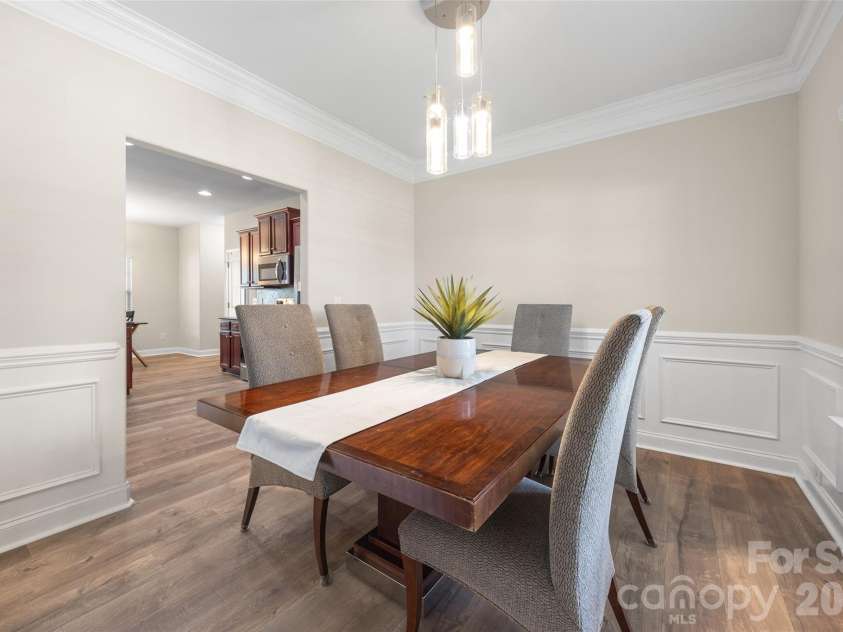 14712 Vaughan Drive, Charlotte, NC 28273.  MLS# CAR4390670, YatesRealty ID 34949. Dining Room looking into kitchen