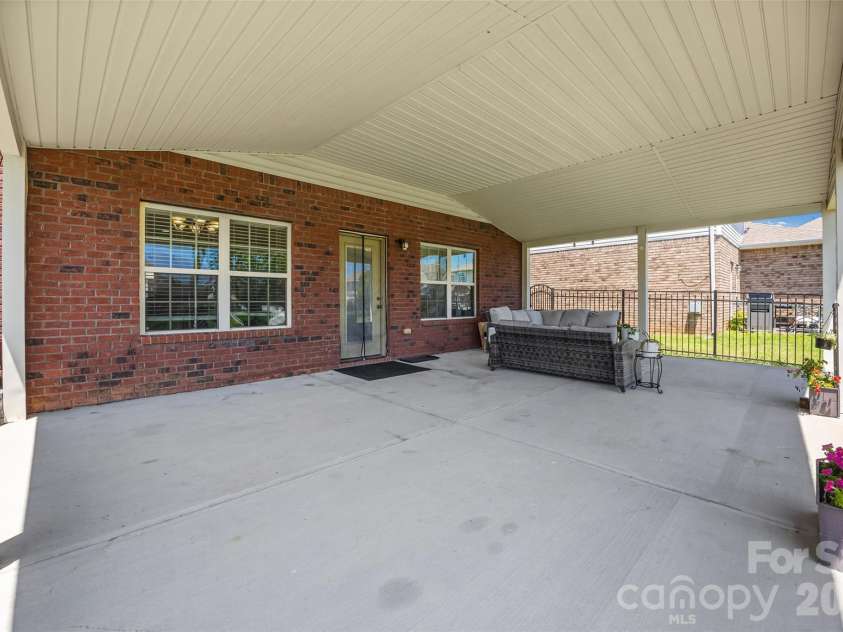 14712 Vaughan Drive, Charlotte, NC 28273.  MLS# CAR4390670, YatesRealty ID 34949. Large Covered Patio (552 sq ft)