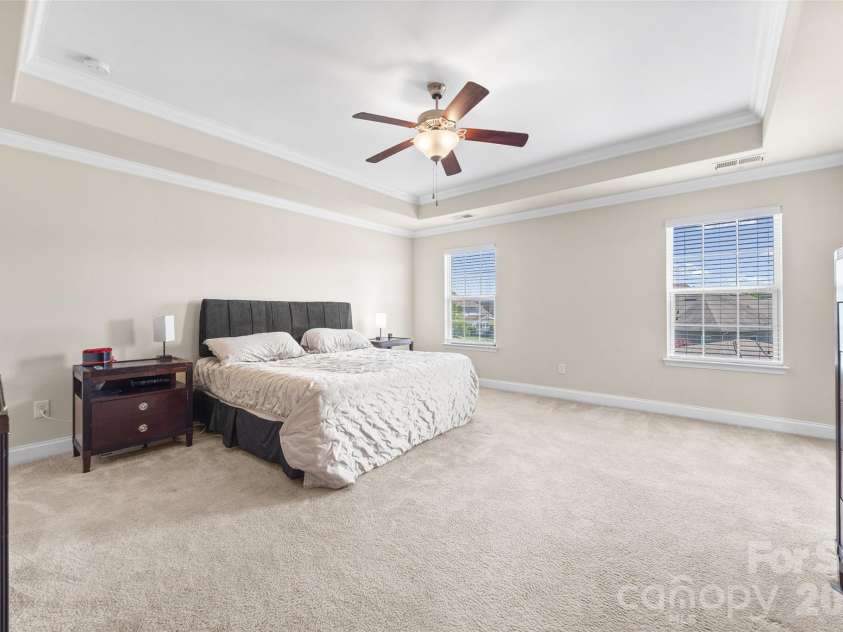 14712 Vaughan Drive, Charlotte, NC 28273.  MLS# CAR4390670, YatesRealty ID 34949. Large Primary Bedroom overlooking backyard