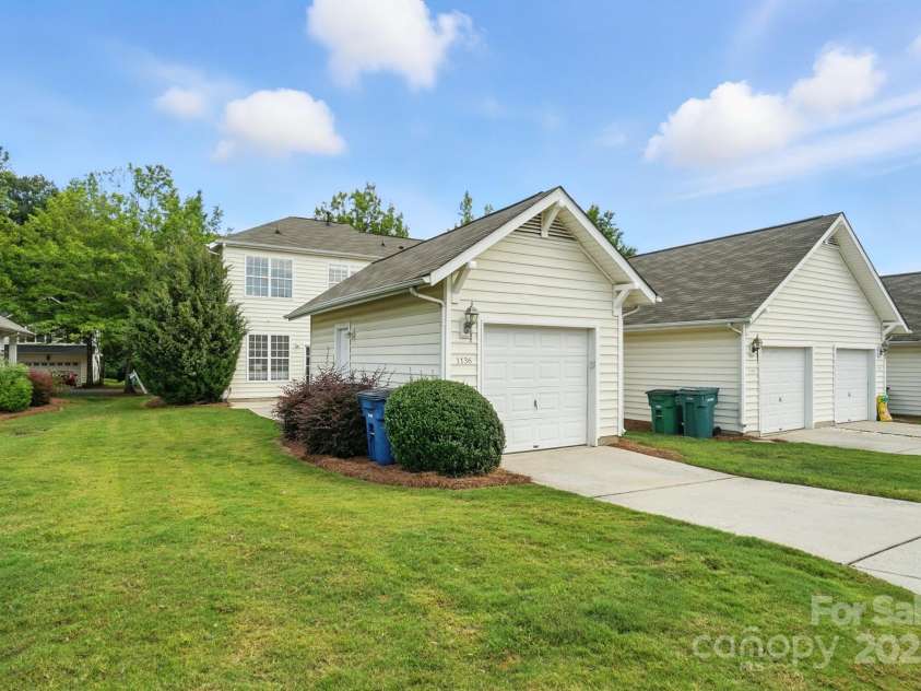 1136 Hammond Drive, Matthews, NC 28104.  MLS# CAR4296408, YatesRealty ID 34955. Garage