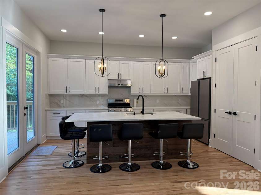 2334 Eagle Glen Court, Gastonia, NC 28056.  MLS# CAR4400481, YatesRealty ID 34955. Kitchen- large island with 6 seats