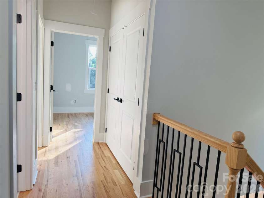 2334 Eagle Glen Court, Gastonia, NC 28056.  MLS# CAR4400481, YatesRealty ID 34955. Upstairs hallway with laundry