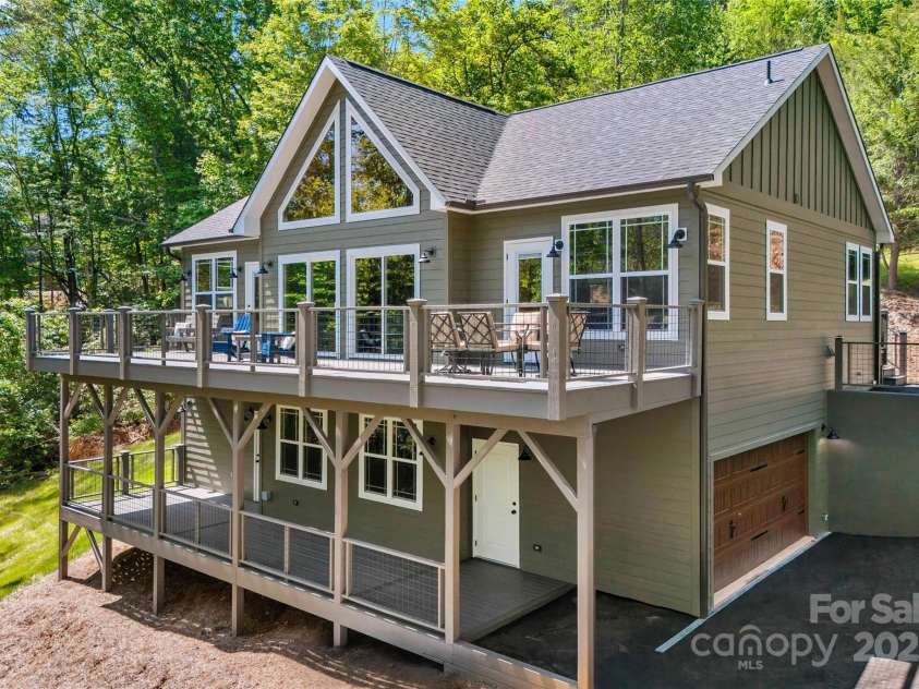 23 Laurel Crest Lane, Mill Spring, NC 28756.  MLS# CAR4294698, YatesRealty ID 34956. Back of home