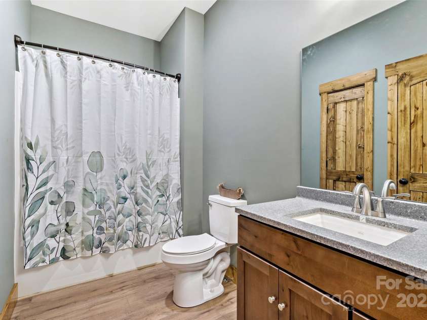 23 Laurel Crest Lane, Mill Spring, NC 28756.  MLS# CAR4294698, YatesRealty ID 34956. Guest bathroom 2 in basement
