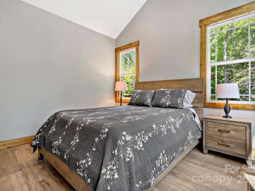 23 Laurel Crest Lane, Mill Spring, NC 28756.  MLS# CAR4294698, YatesRealty ID 34956. Guest bedroom 1 on main level