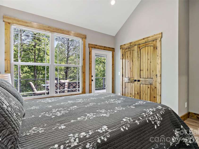 23 Laurel Crest Lane, Mill Spring, NC 28756.  MLS# CAR4294698, YatesRealty ID 34956. Guest bedroom 1 on main level