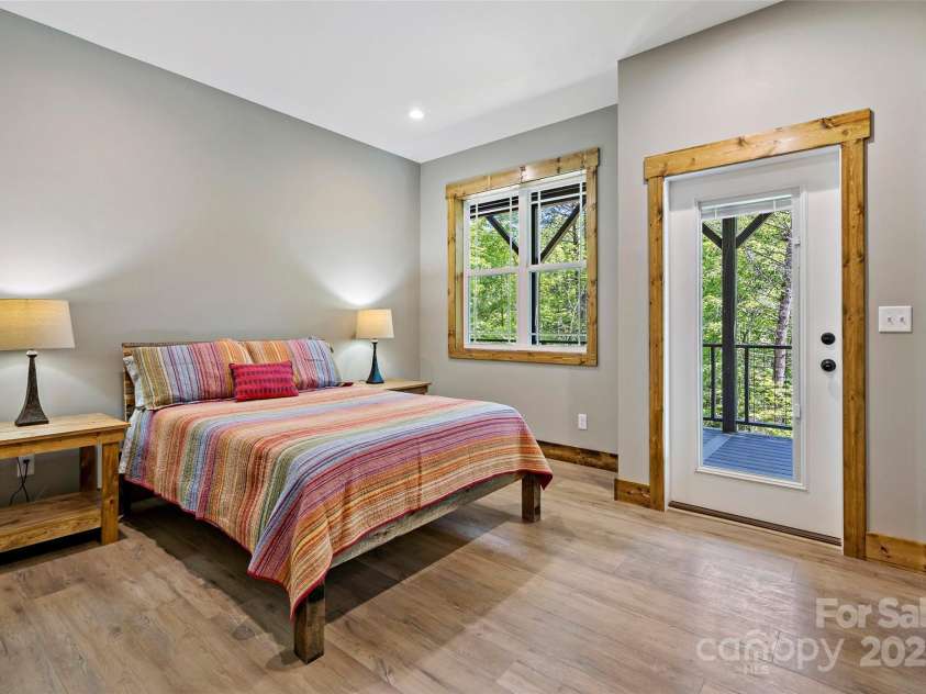 23 Laurel Crest Lane, Mill Spring, NC 28756.  MLS# CAR4294698, YatesRealty ID 34956. Guest bedroom 2 in basement