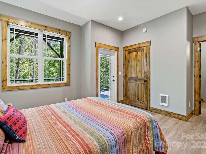 23 Laurel Crest Lane, Mill Spring, NC 28756.  MLS# CAR4294698, YatesRealty ID 34956. Guest bedroom 2 in basement
