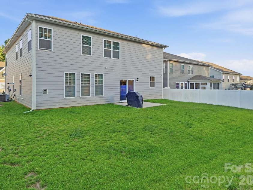 108 Northstone Road, Mooresville, NC 28115.  MLS# CAR4382217, YatesRealty ID 34959. Back Yard and Patio