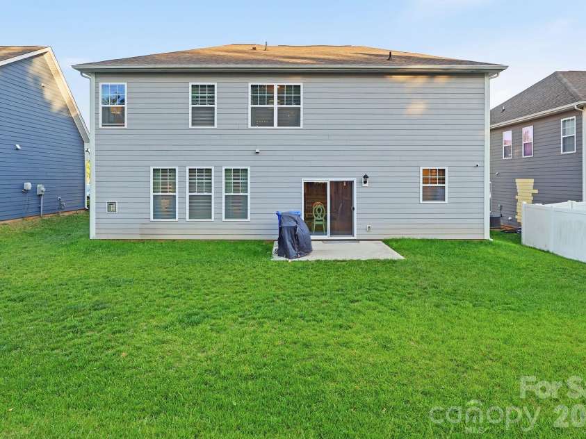 108 Northstone Road, Mooresville, NC 28115.  MLS# CAR4382217, YatesRealty ID 34959. Back Yard and Patio
