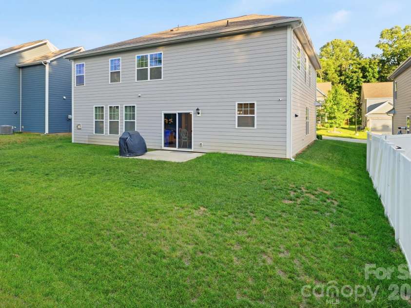 108 Northstone Road, Mooresville, NC 28115.  MLS# CAR4382217, YatesRealty ID 34959. Back Yard and Patio