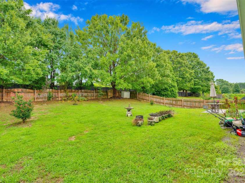 2014 Arbor Crest Court, Charlotte, NC 28262.  MLS# CAR4289262, YatesRealty ID 3496. Backyard