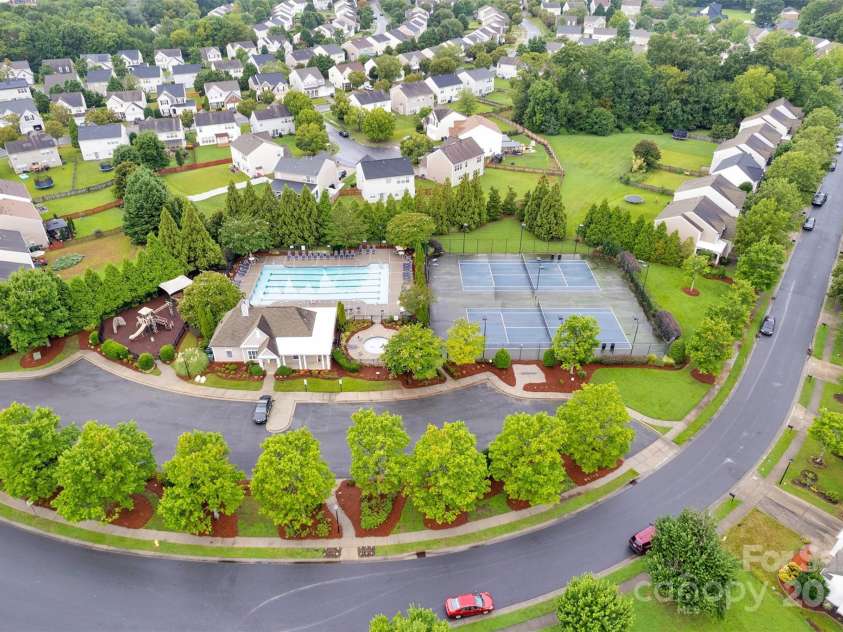 2014 Arbor Crest Court, Charlotte, NC 28262.  MLS# CAR4289262, YatesRealty ID 3496. Pool & Tennis Court