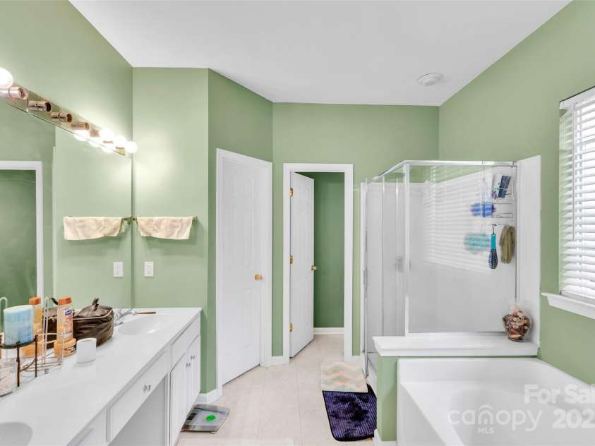 2014 Arbor Crest Court, Charlotte, NC 28262.  MLS# CAR4289262, YatesRealty ID 3496. Primary Bathroom & Walk in Closet