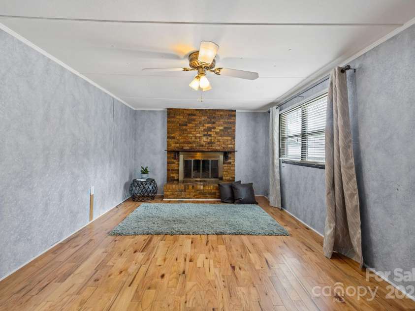 105 Corn Drive, Cedar Mountain, NC 28718.  MLS# CAR4289509, YatesRealty ID 3497. Fireplace for cool nights