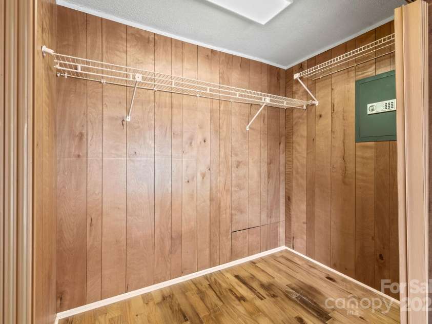 105 Corn Drive, Cedar Mountain, NC 28718.  MLS# CAR4289509, YatesRealty ID 3497.    Hall closet outside primary bedroom