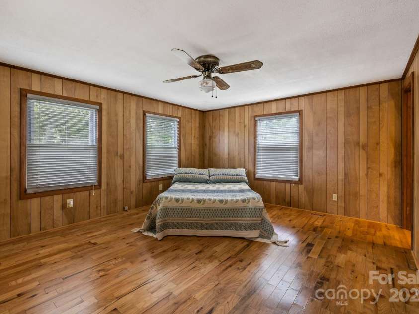 105 Corn Drive, Cedar Mountain, NC 28718.  MLS# CAR4289509, YatesRealty ID 3497.    Primary bedroom