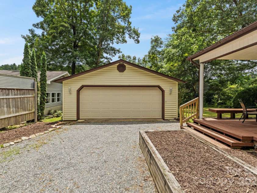 105 Corn Drive, Cedar Mountain, NC 28718.  MLS# CAR4289509, YatesRealty ID 3497. Two car garage