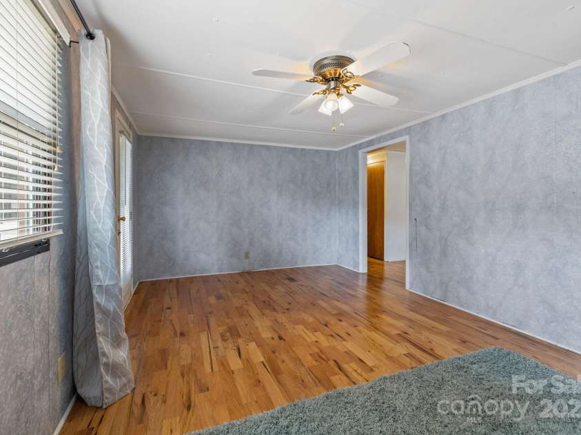 105 Corn Drive, Cedar Mountain, NC 28718.  MLS# CAR4289509, YatesRealty ID 3497. View to kitchen