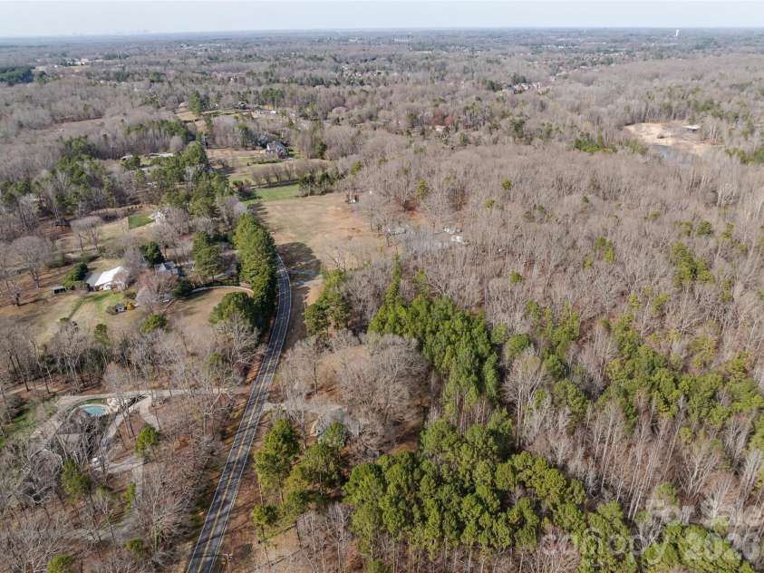 3109 Forest Lawn Drive, Matthews, NC 28104.  MLS# CAR4353965, YatesRealty ID 3497. 10 Miles to Downtown Waxhaw