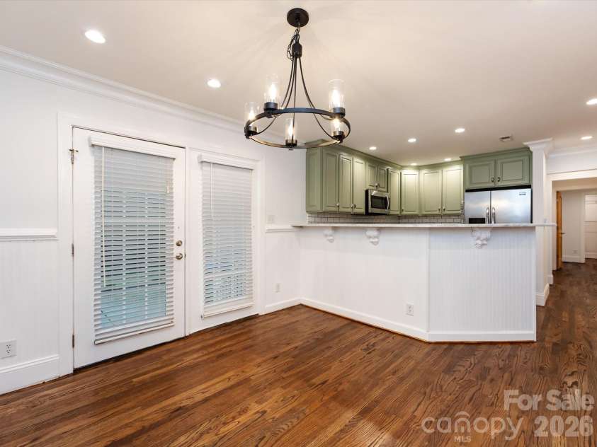 3109 Forest Lawn Drive, Matthews, NC 28104.  MLS# CAR4353965, YatesRealty ID 3497. Dining room with back patio access