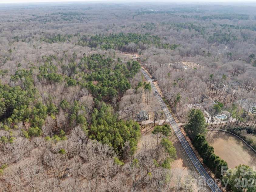3109 Forest Lawn Drive, Matthews, NC 28104.  MLS# CAR4353965, YatesRealty ID 3497. Surrounded by Million dollar homes
