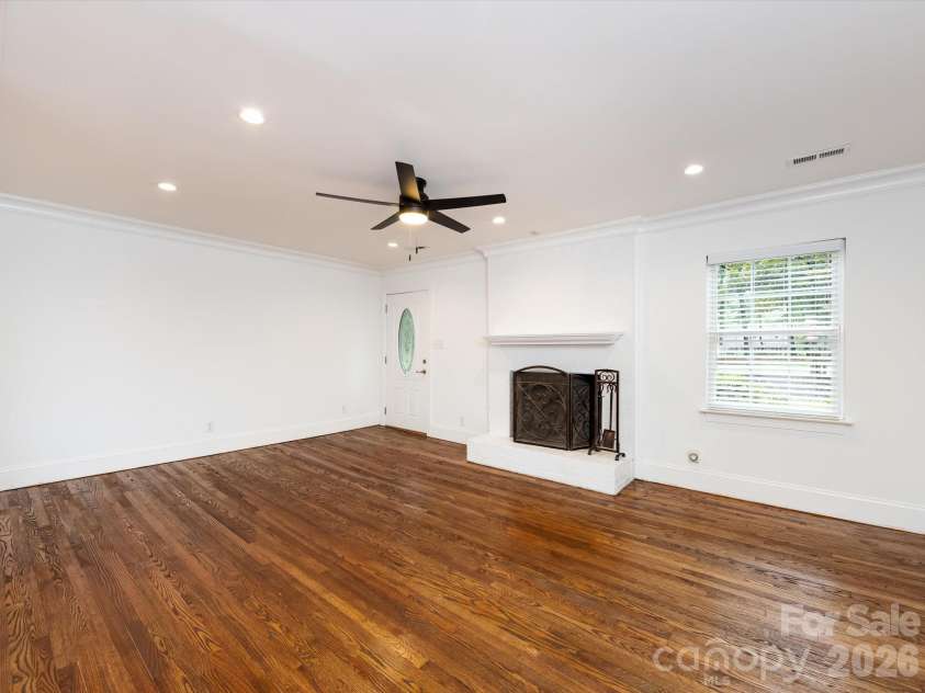 3109 Forest Lawn Drive, Matthews, NC 28104.  MLS# CAR4353965, YatesRealty ID 3497. Wood burning fireplace
