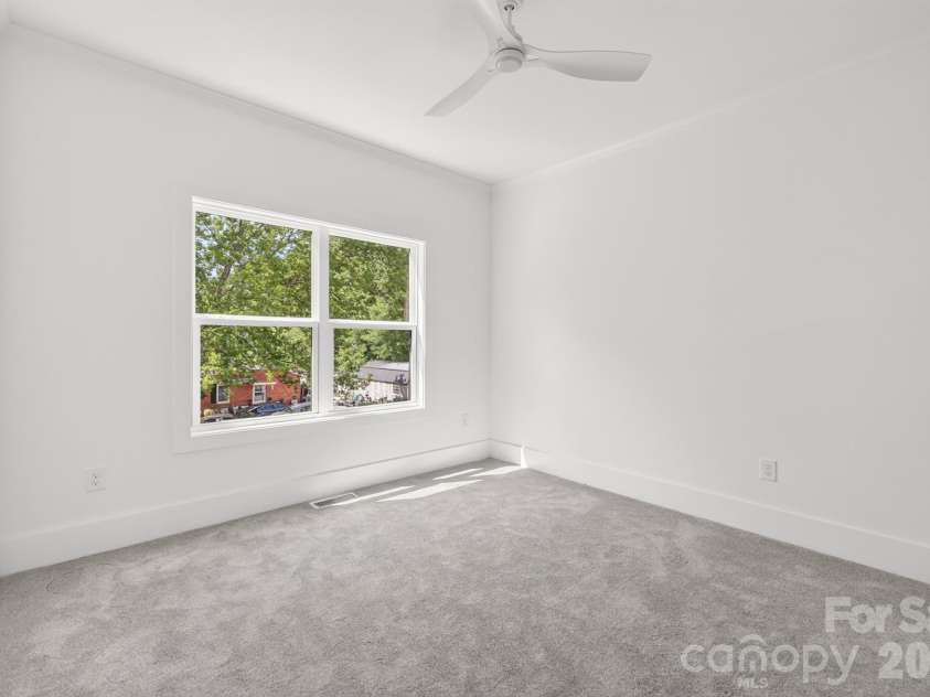 411 Brevard Street, Waxhaw, NC 28173.  MLS# CAR4397400, YatesRealty ID 34977. Secondary bedroom on upper level