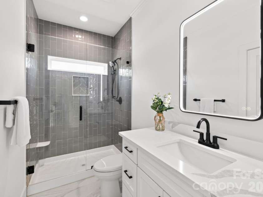 411 Brevard Street, Waxhaw, NC 28173.  MLS# CAR4397400, YatesRealty ID 34977. Secondary full bath on the upper level