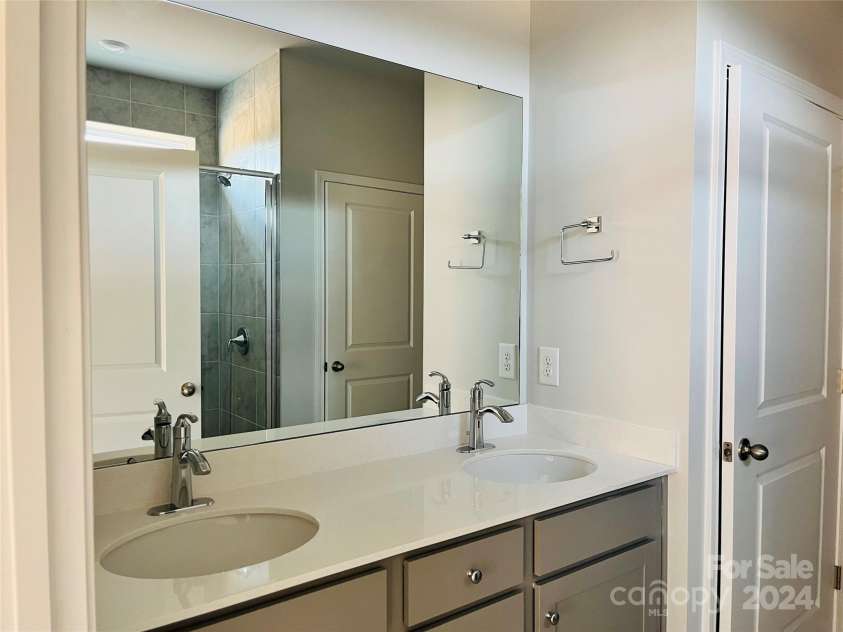 1066 Bull Dog Lane, Wingate, NC 28174.  MLS# CAR4204217, YatesRealty ID 3498. Primary bathroom