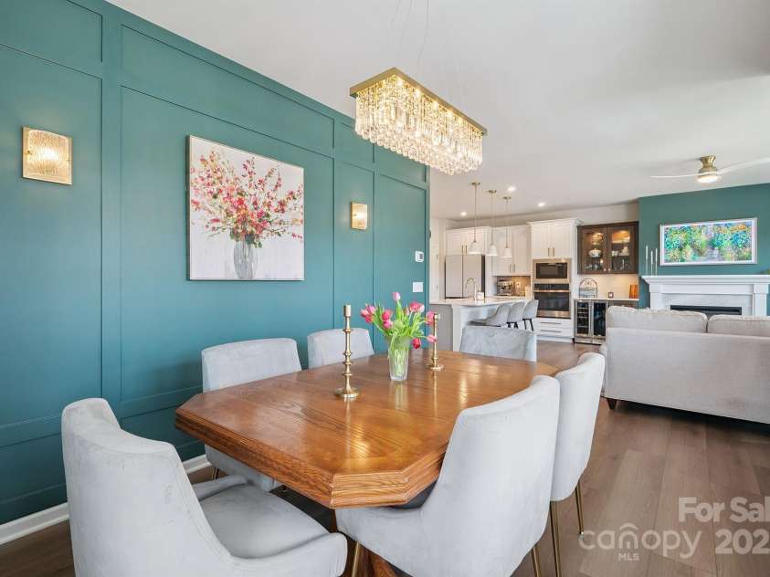 3161 Baines Court, Kannapolis, NC 28081.  MLS# CAR4283103, YatesRealty ID 34980. Beautiful Dining Area with accent wall, custom chandelier & LVP flooring!