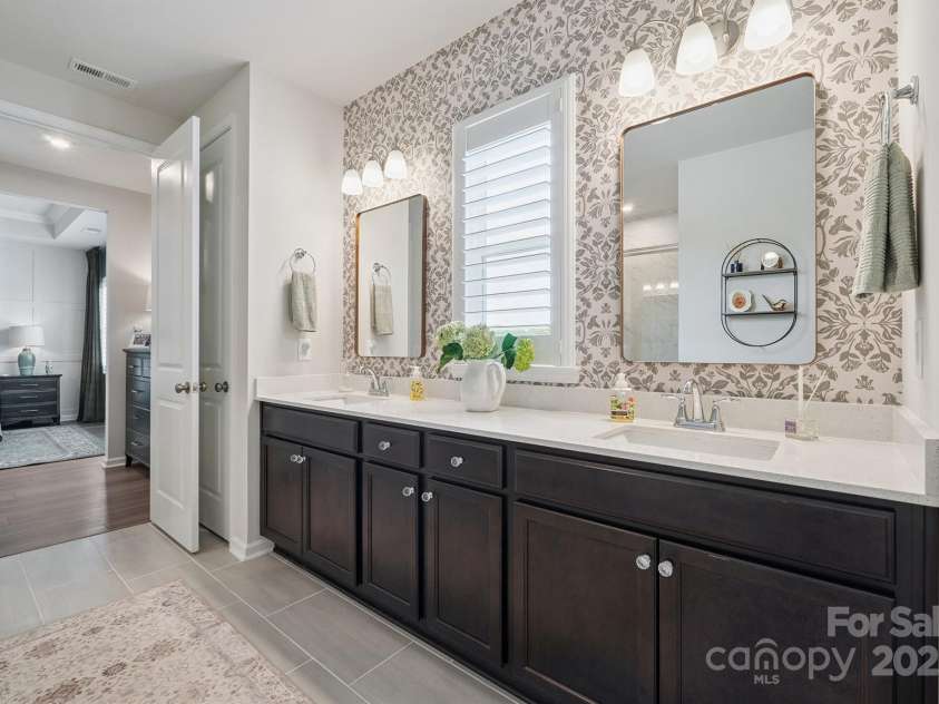 3161 Baines Court, Kannapolis, NC 28081.  MLS# CAR4283103, YatesRealty ID 34980. Primary Bath offers dual vanity, tiled shower & tile floors!
