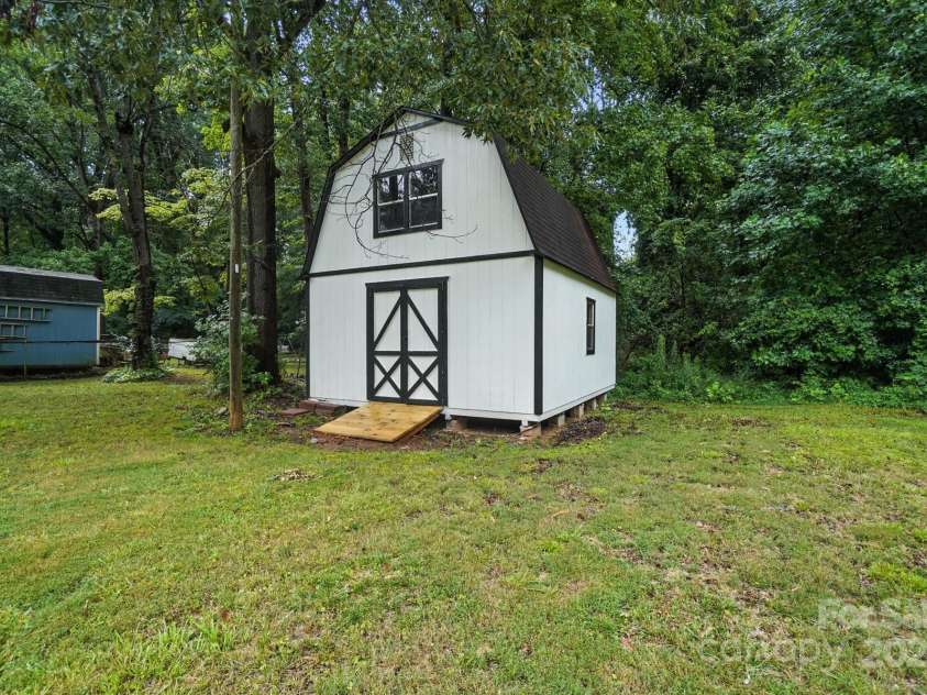 3921 Lake Road, Charlotte, NC 28269.  MLS# CAR4272697, YatesRealty ID 34981. Storage Shed