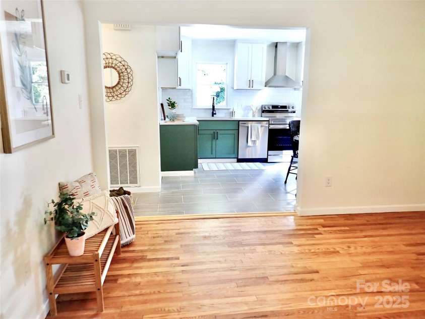 3921 Lake Road, Charlotte, NC 28269.  MLS# CAR4272697, YatesRealty ID 34981. View of the kitchen from living room
